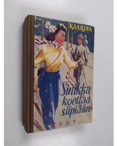 Kirjailijan Kaarina käytetty kirja Sinikka koettaa siipiään