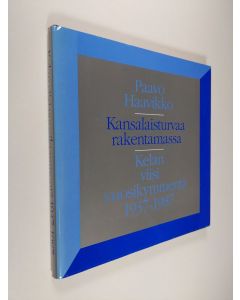 Kirjailijan Paavo Haavikko käytetty kirja Kansalaisturvaa rakentamassa : Kelan viisi vuosikymmentä 1937-1987