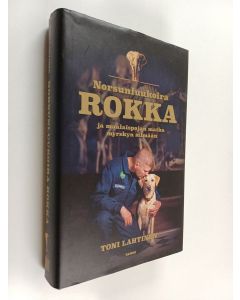Kirjailijan Toni Lahtinen käytetty kirja Norsunluukoira Rokka ja maalaispojan matka myrskyn silmään