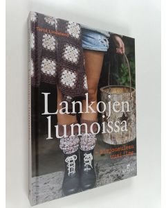 Kirjailijan Turid Lindeland käytetty kirja Lankojen lumoissa : kirjoneuleen uusi ilme