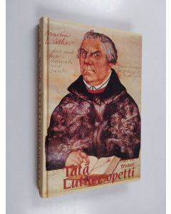 Kirjailijan Fredrik Wislöff käytetty kirja Tätä Luther opetti