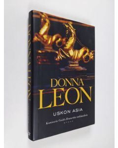 Kirjailijan Donna Leon käytetty kirja Uskon asia : komisario Guido Brunettin tutkimuksia