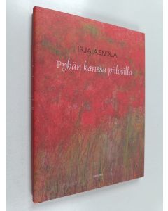 Kirjailijan Irja Askola käytetty kirja Pyhän kanssa piilosilla