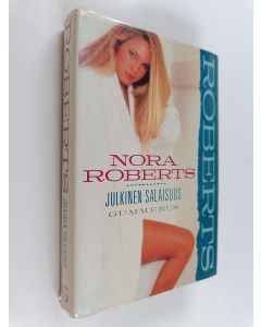 Kirjailijan Nora Roberts käytetty kirja Julkinen salaisuus