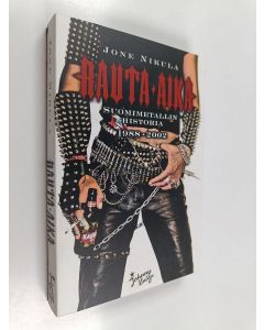 Kirjailijan Jone Nikula käytetty kirja Rauta-aika : suomimetallin historia 1988-2002 (ERINOMAINEN)