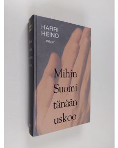 Kirjailijan Harri Heino käytetty kirja Mihin Suomi tänään uskoo (signeerattu, tekijän omiste)