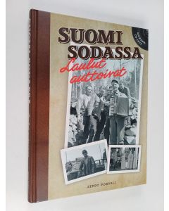 Kirjailijan Seppo Porvali käytetty kirja Suomi sodassa : laulut auttoivat