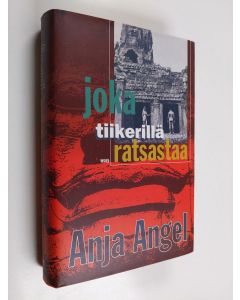 Kirjailijan Anja Angel käytetty kirja Joka tiikerillä ratsastaa