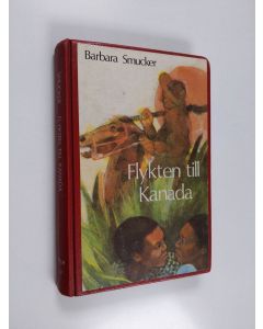 Kirjailijan Barbara Smucker käytetty kirja Flykten till Kanada