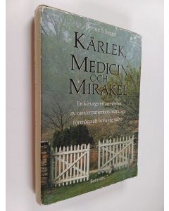 Kirjailijan Bernie S. Siegel käytetty kirja Kärlek, medicin och mirakel : en kirurgs erfarenhet av cancerpatienters märkliga förmåga att bota sig själva