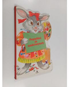 Kirjailijan Giovanni Giannini käytetty kirja Pupuliini ja taidenäyttely