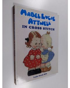 Kirjailijan Leslie Norah Hills käytetty kirja Mabel Lucie Attwell in Cross Stitch