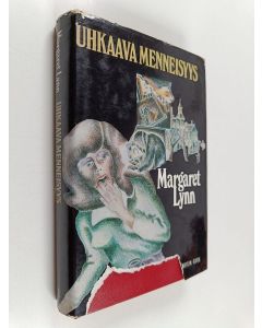 Kirjailijan Margaret Lynn käytetty kirja Uhkaava menneisyys : Jännitysromaani