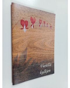 käytetty teos Vierellä kulkien