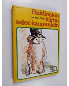 Kirjailijan Michael Bond käytetty kirja Paddington-karhu tulee kaupunkiin