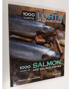Kirjailijan Pekka Muhonen käytetty kirja 1000 vuotta lohta ja lohiruokia = 1000 years of salmon and salmon dishes
