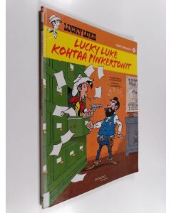 Kirjailijan Achde käytetty kirja Lucky Luke kohtaa Pinkertonit