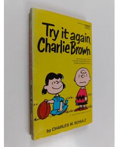 Kirjailijan Charles M. Schulz käytetty kirja Try it Again, Charlie Brown