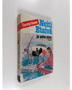 Kirjailijan Carolyn Keene käytetty kirja Neiti Etsivä ja paha enne