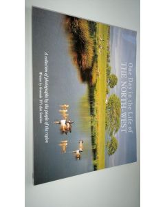 käytetty kirja One day in the life of the North West - a collection of photographs by the people of the region (ERINOMAINEN)