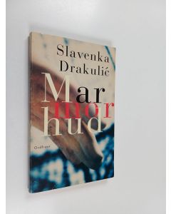 Kirjailijan Slavenka Drakulic käytetty kirja Marmorhud