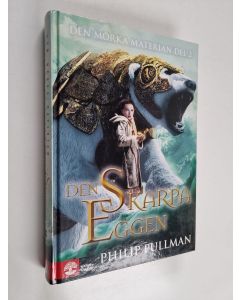 Kirjailijan Philip Pullman käytetty kirja Den skarpa eggen