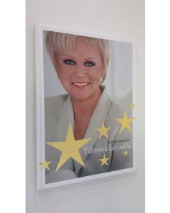 Kirjailijan Katri Helena Kalaoja käytetty kirja Tähtenä taivaalla : lauluja ja tarinoita