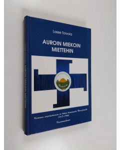 Kirjailijan Lasse Toivola käytetty kirja Auroin, miekoin, miettehin : kertomus suojeluskunnan ja lottien toiminnasta Hausjärvellä 1917-1944