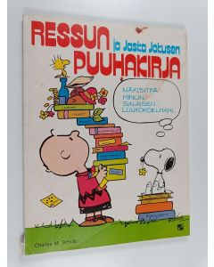Kirjailijan Charles M. Schulz käytetty kirja Ressun ja Jaska Jokusen puuhakirja