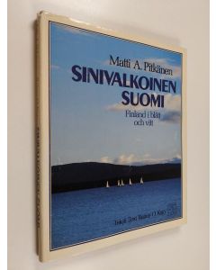 Kirjailijan Matti A. Pitkänen käytetty kirja Sinivalkoinen Suomi = Finland i blått och vitt