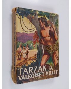 Kirjailijan Edgar Rice Burroughs käytetty kirja Tarzan ja valkoiset villit : seikkailukertomus villistä Afrikasta