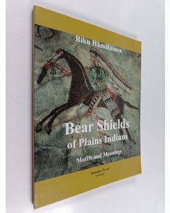 Kirjailijan Riku Hämäläinen käytetty kirja Bear shields of plain indians - Motifs and meanings