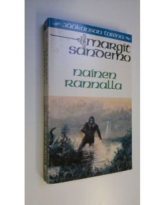 Kirjailijan Margit Sandemo käytetty kirja Nainen rannalla