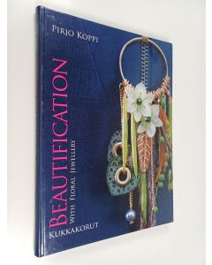 Kirjailijan Pirjo Koppi käytetty kirja Beautification : with floral jewellery = Kukkakorut - Kukkakorut