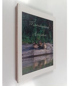 Kirjailijan Ari Törmä käytetty kirja Määränpäänä Hirsijärvi : Ari Törmän luontokuvia Kiskon Hirsijärven maisemista