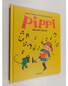 Kirjailijan Astrid Lindgren käytetty kirja Pippi håller kalas