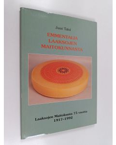 Kirjailijan Jussi Talvi käytetty kirja Emmentalia Laaksojen maitokunnasta : Laaksojen maitokunta 75 vuotta 1917-1992