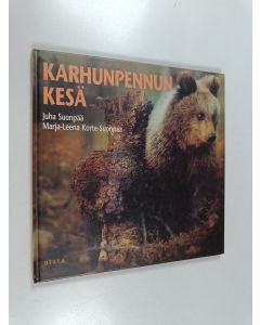Kirjailijan Juha Suonpää käytetty kirja Karhunpennun kesä