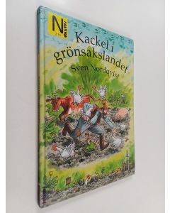 Kirjailijan Sven Nordqvist käytetty kirja Kackel i grönsakslandet