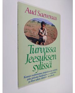 Kirjailijan Aud Saeveraas käytetty kirja Turvassa jeesuksen sylissä