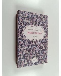 Kirjailijan Louisa M. Alcott käytetty kirja Pikku naisia