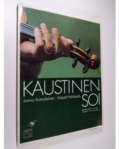 Kirjailijan Jorma Komulainen käytetty kirja Kaustinen soi
