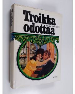 Kirjailijan Ira J. Morris käytetty kirja Troikka odottaa
