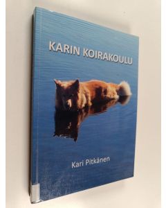 Kirjailijan Kari Pitkänen käytetty kirja Karin koirakoulu