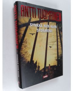 Kirjailijan Antti Tuomainen käytetty kirja Synkkä niin kuin sydämeni