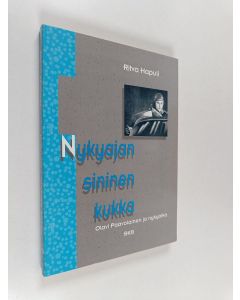 Kirjailijan Ritva Hapuli käytetty kirja Nykyajan sininen kukka : Olavi Paavolainen ja nykyaika