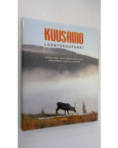 Kirjailijan Paavo Hamunen käytetty kirja Kuusamo (signeerattu) : luontokaupunki = nature town = Stadt inmitten der Natur = naturstaden = ville de la nature