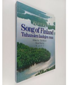 Tekijän Einari Marvia  käytetty kirja Song of Finland = Tuhansien laulujen maa : lauluja Suomesta