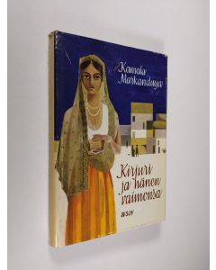 Kirjailijan Kamala Markandaya käytetty kirja Kirjuri ja hänen vaimonsa