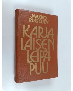 Kirjailijan Jaakko Rugojev käytetty kirja Karjalaisen leipäpuu : valittuja runoja